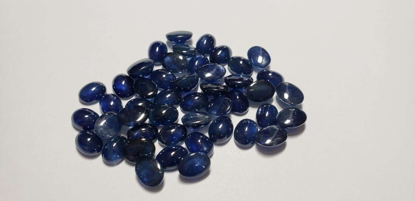 Blue Sapphire Cabochon: 8mm x 6mm